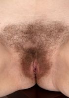 Kady tugs on her furry snatch., Kady (kad009) ATK Natural & Hairy: Kady (Kady tugs on her furry snatch.)