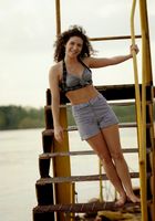Sativa is outside at the dock, stripping by the waterfront., Sativa Verte (sat007) ATK Natural & Hairy: Sativa Verte (Sativa is outside at the dock, stripping by the waterfront.)